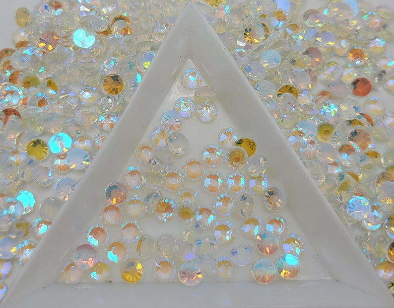 White Aurora rhinestones shown loose to show sparkle and cut