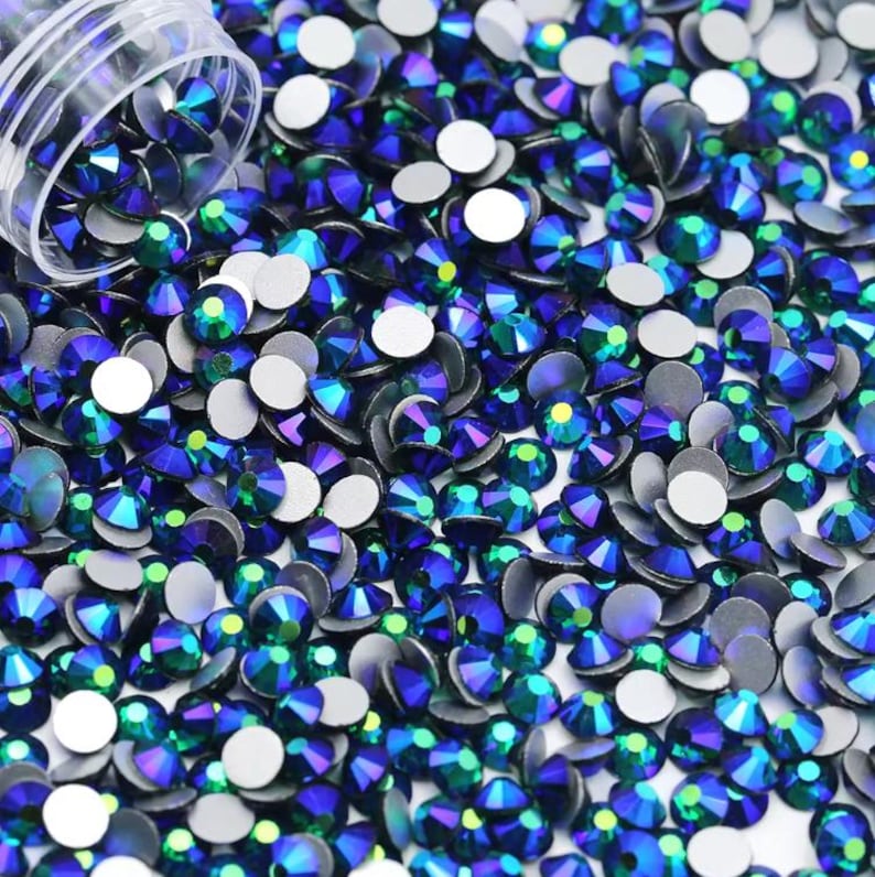 Emerald AB rhinestones shown loose to show sparkle and cut