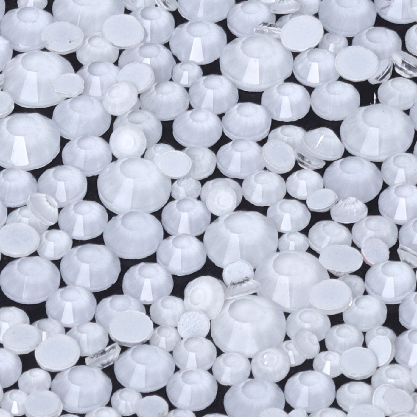 White Neon rhinestones shown loose to show sparkle and cut