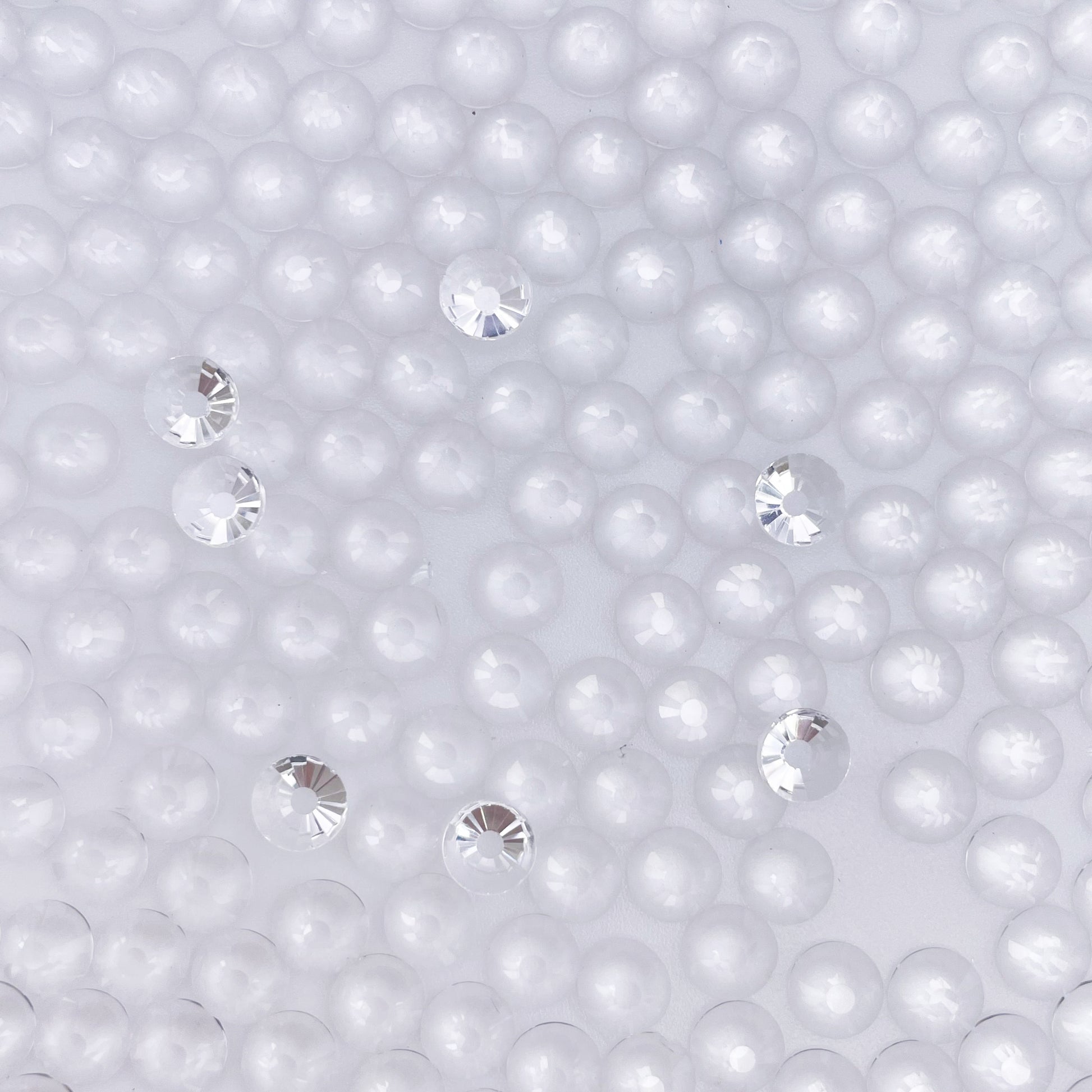 Transparent Clear rhinestones shown loose to show sparkle and cut
