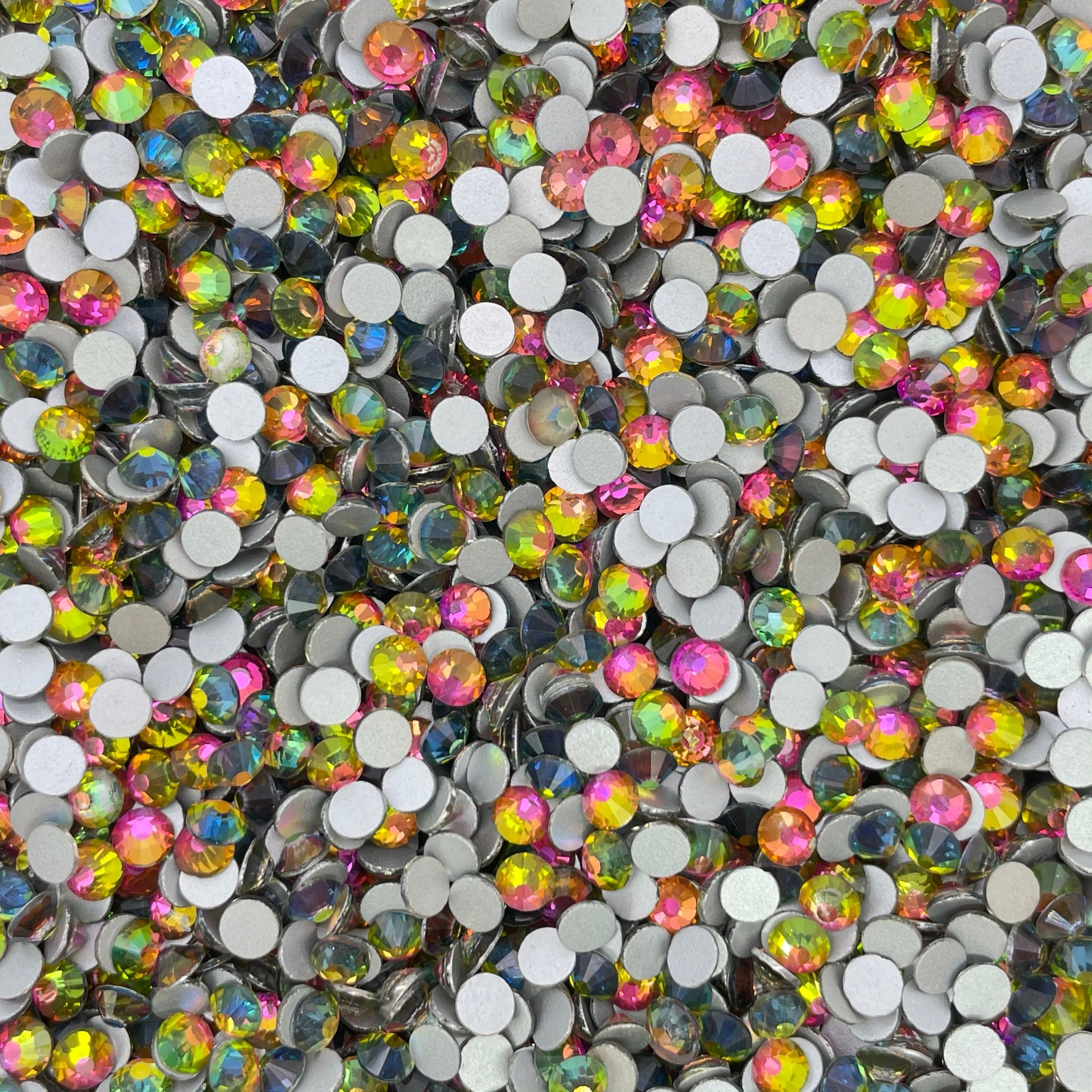 Rainbow rhinestones shown loose to show sparkle and cut