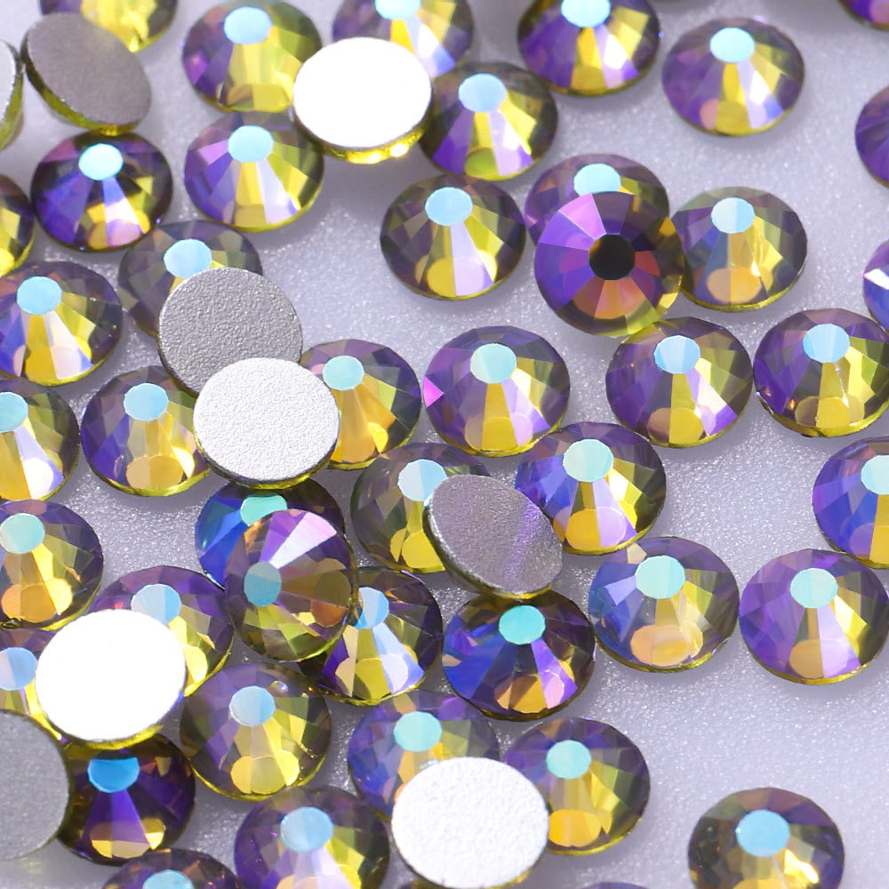 Olive AB rhinestones shown loose to show sparkle and cut