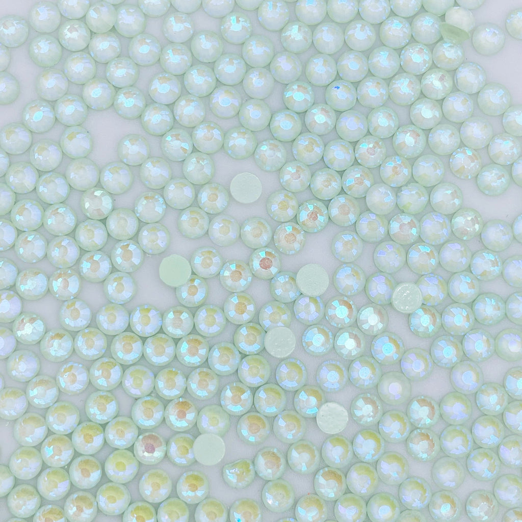 Light Peridot Luminous rhinestones shown loose to show sparkle and cut