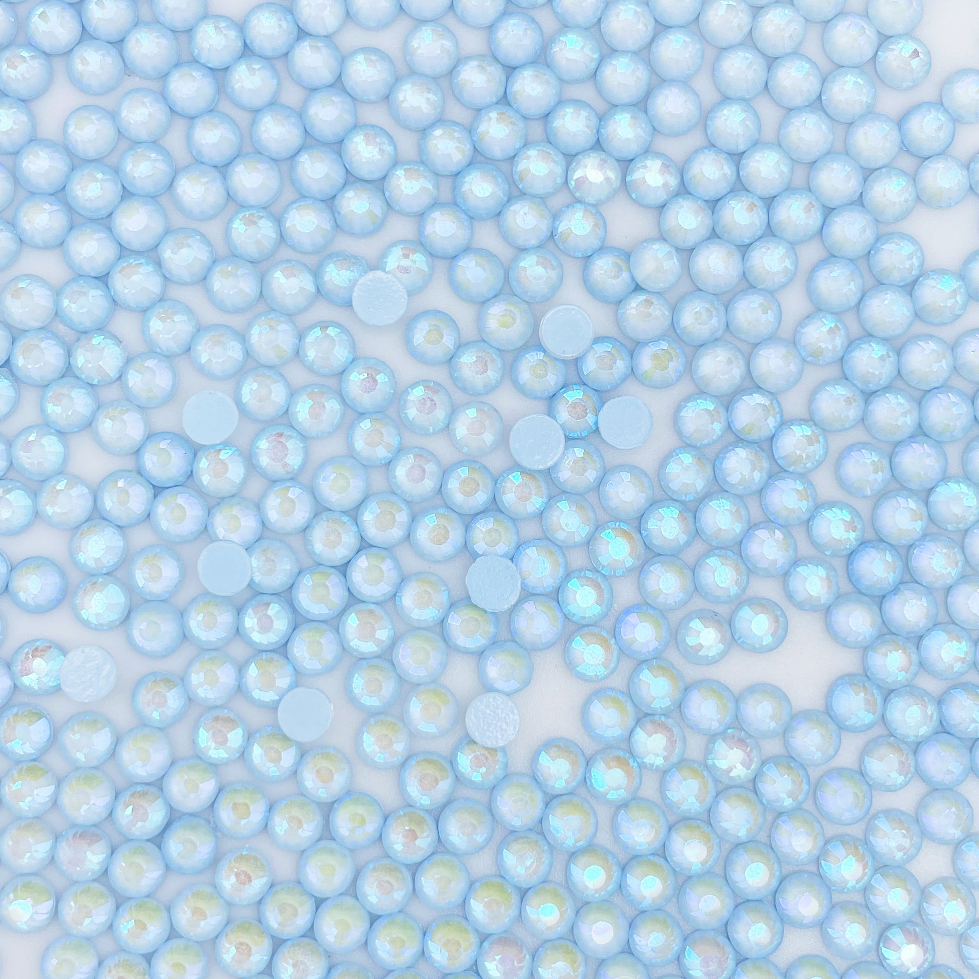 Light Sapphire Luminous flatback rhinestones size comparison, SS3 to SS60
