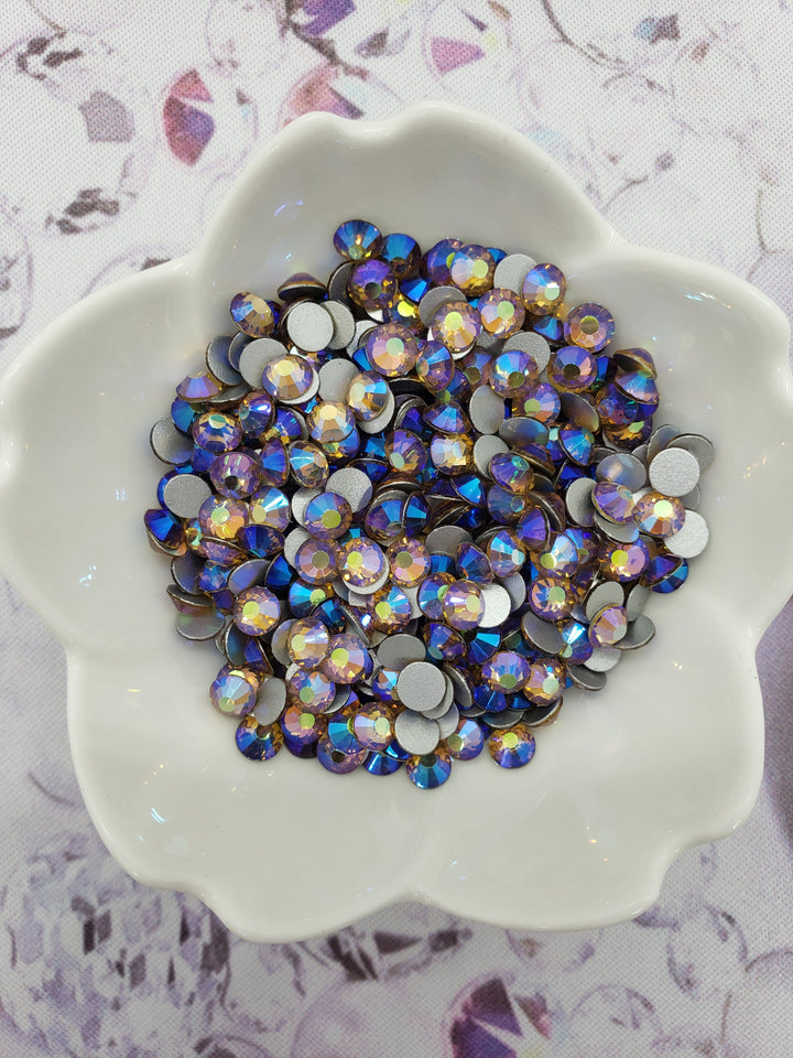 Close-up of Light Colorado Topaz AB glass rhinestone facets and flat back