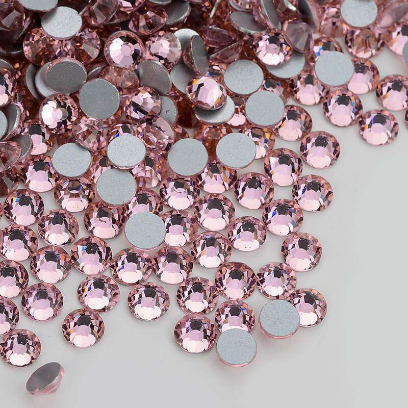 Light Pink rhinestones shown loose to show sparkle and cut