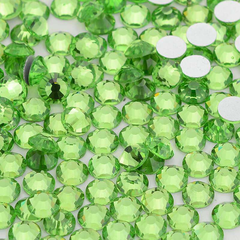 Lt Peridot rhinestones shown loose to show sparkle and cut