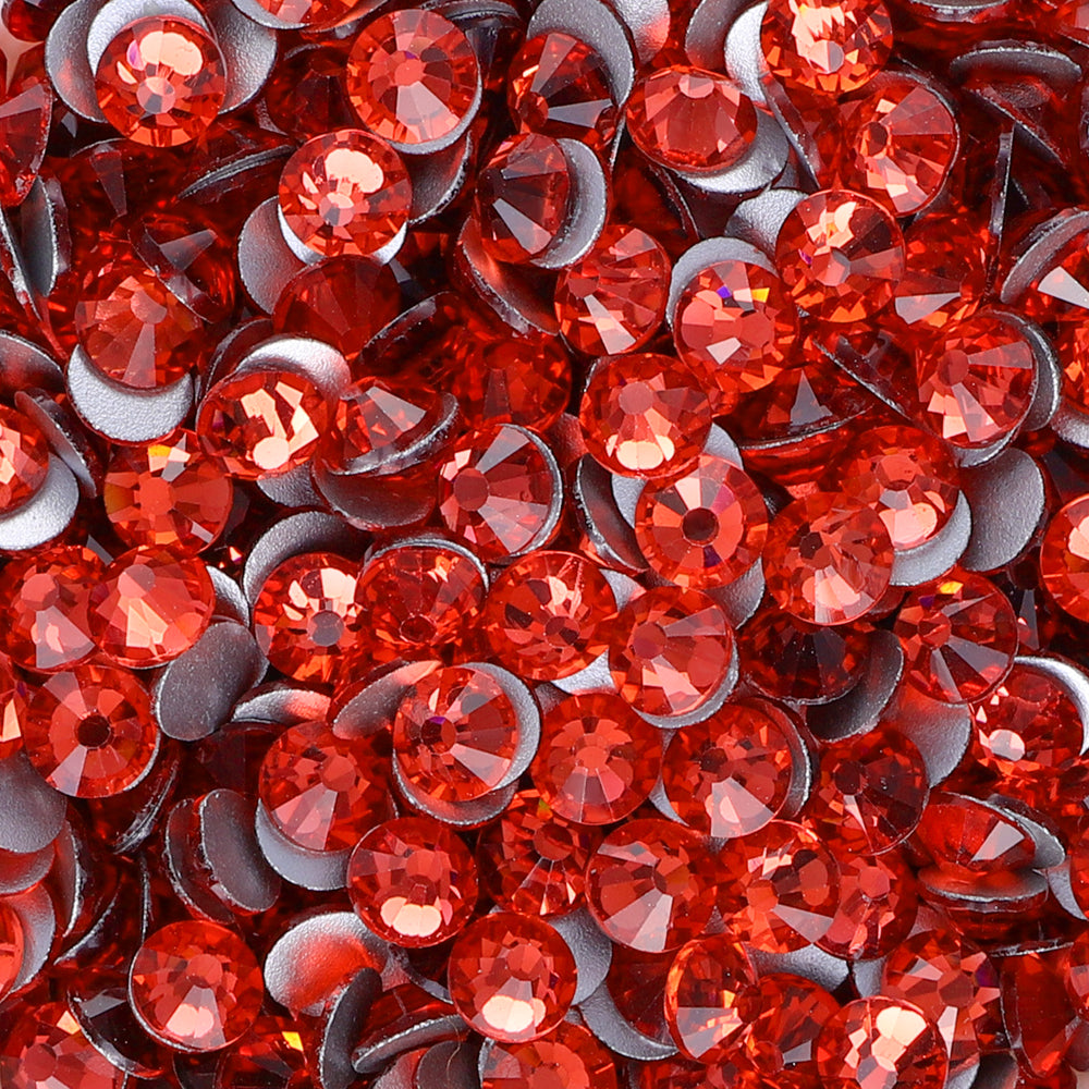 Padparadascha rhinestones shown loose to show sparkle and cut