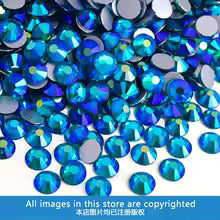 Peacock Blue AB rhinestones shown loose to show sparkle and cut