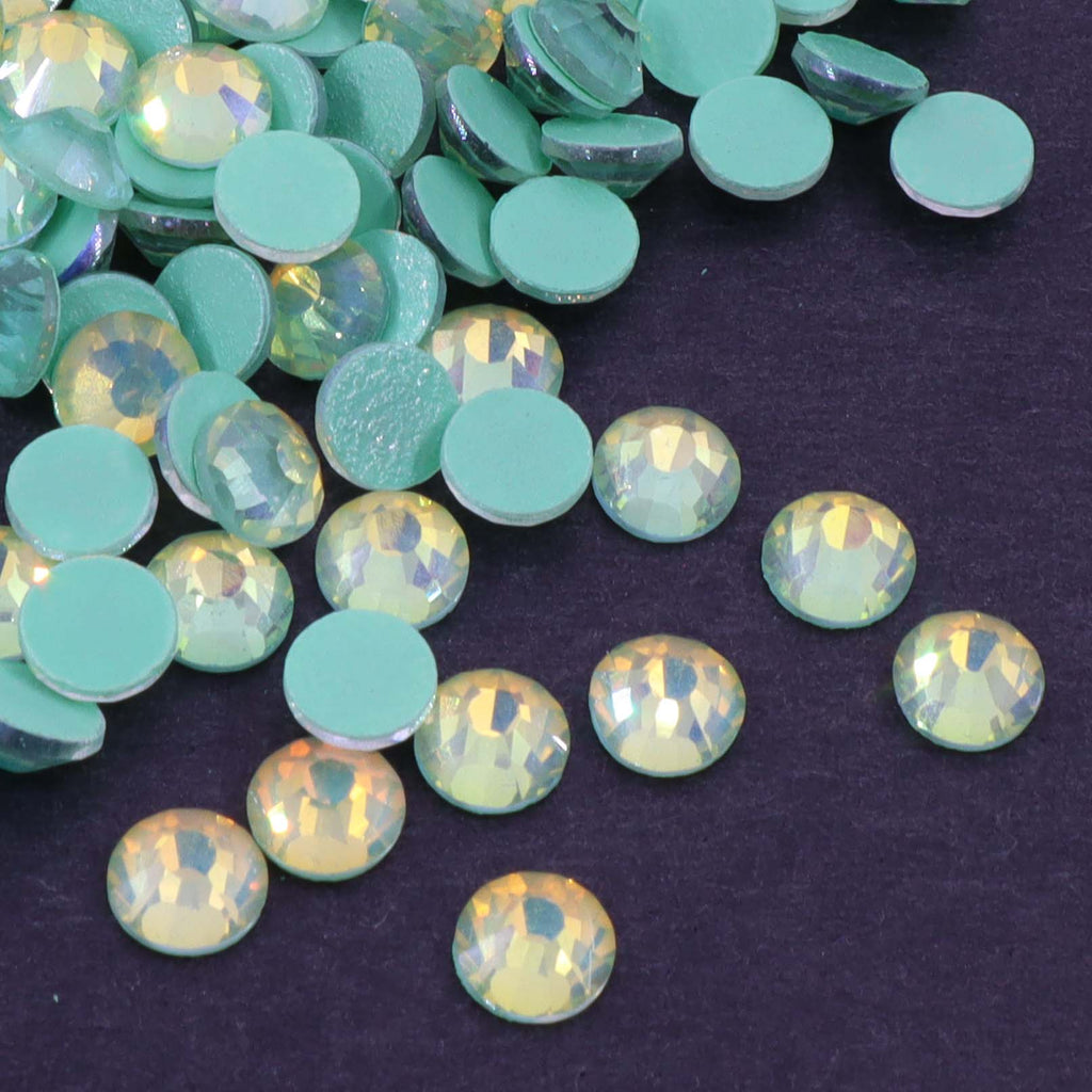 Emerald Luminous Opal rhinestones shown loose to show sparkle and cut