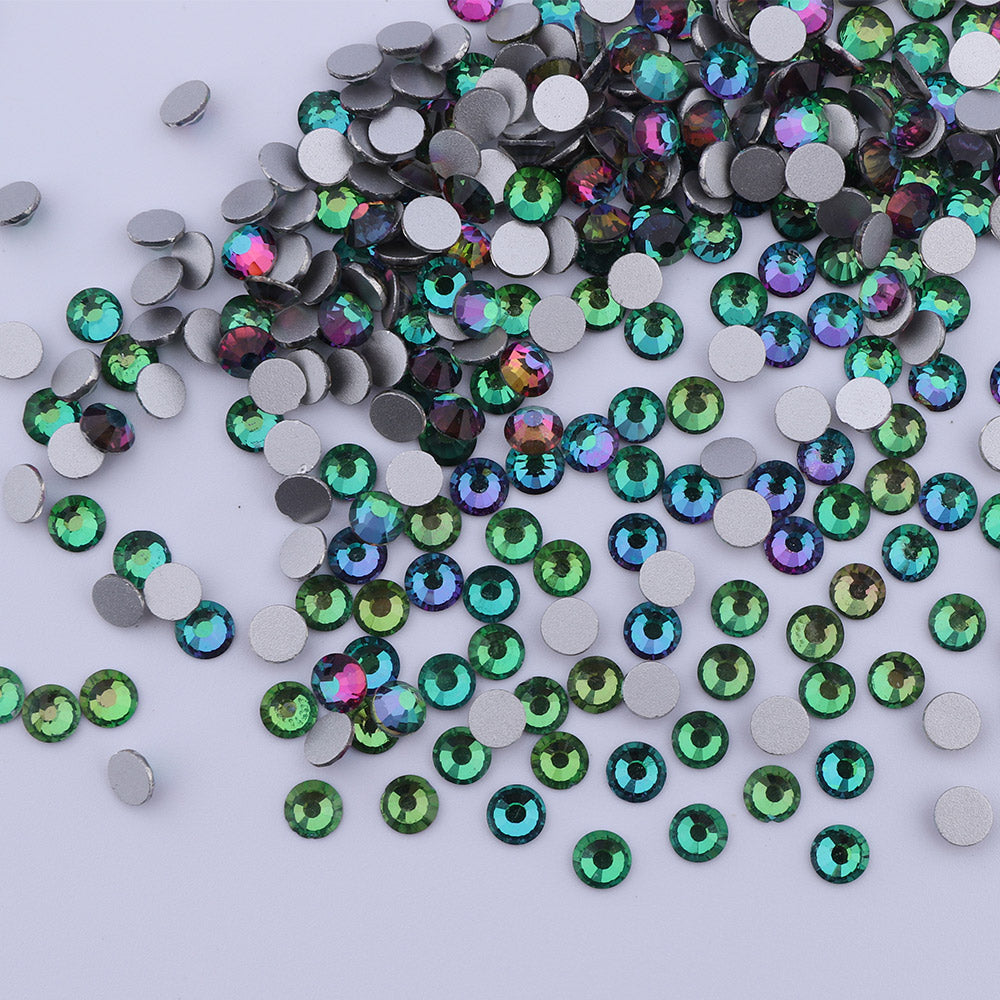 Green Volcano rhinestones shown loose to show sparkle and cut