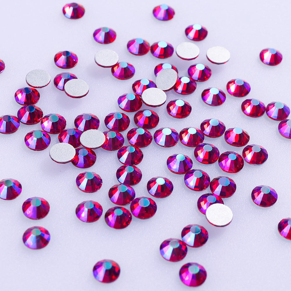 Siam AB rhinestones shown loose to show sparkle and cut