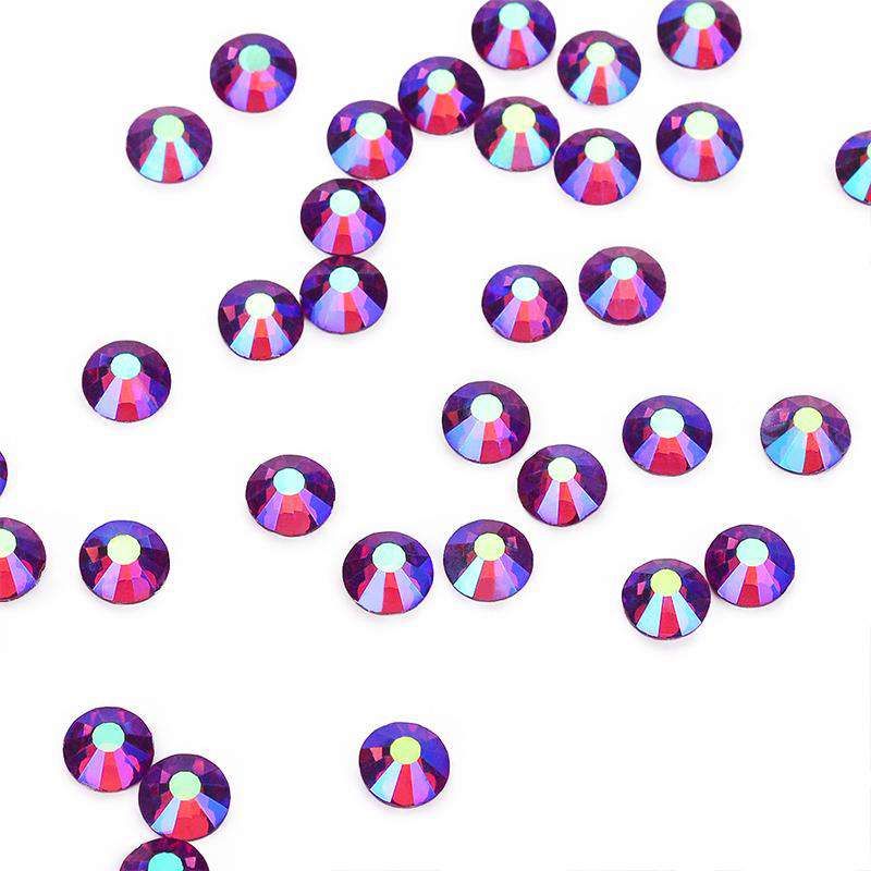 Fuchsia AB rhinestones shown loose to show sparkle and cut
