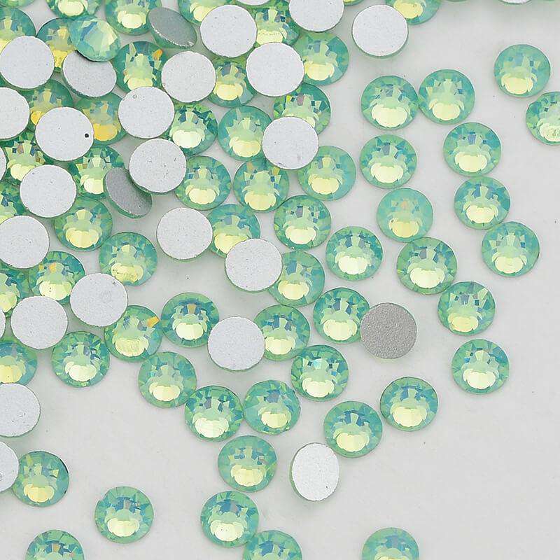 Green Opal rhinestones shown loose to show sparkle and cut