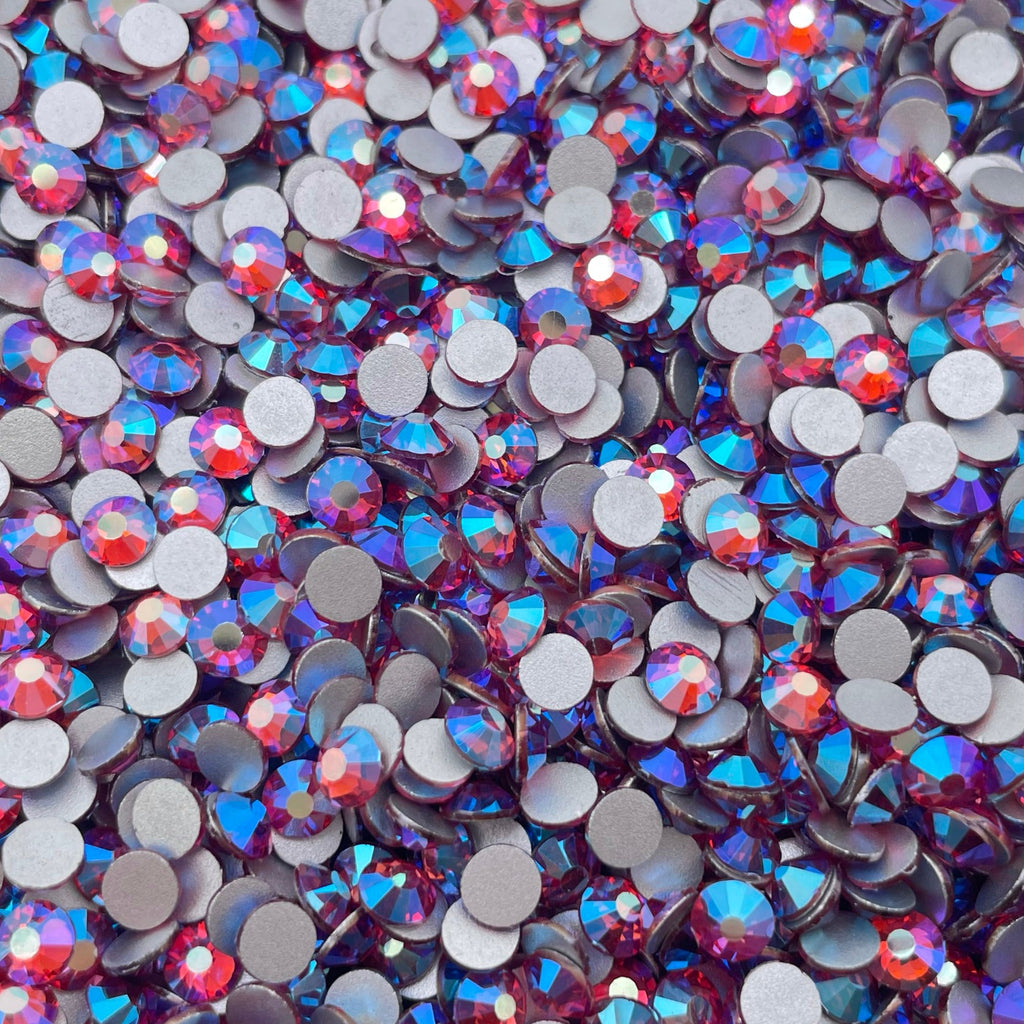 Rose AB rhinestones shown loose to show sparkle and cut
