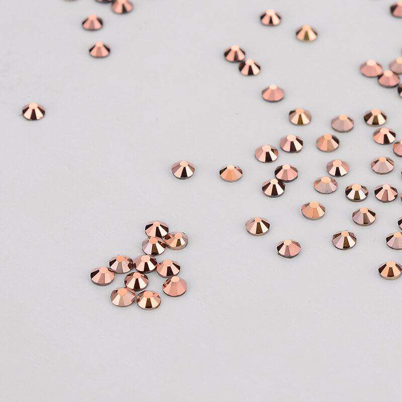 Rose Gold rhinestones shown loose to show sparkle and cut