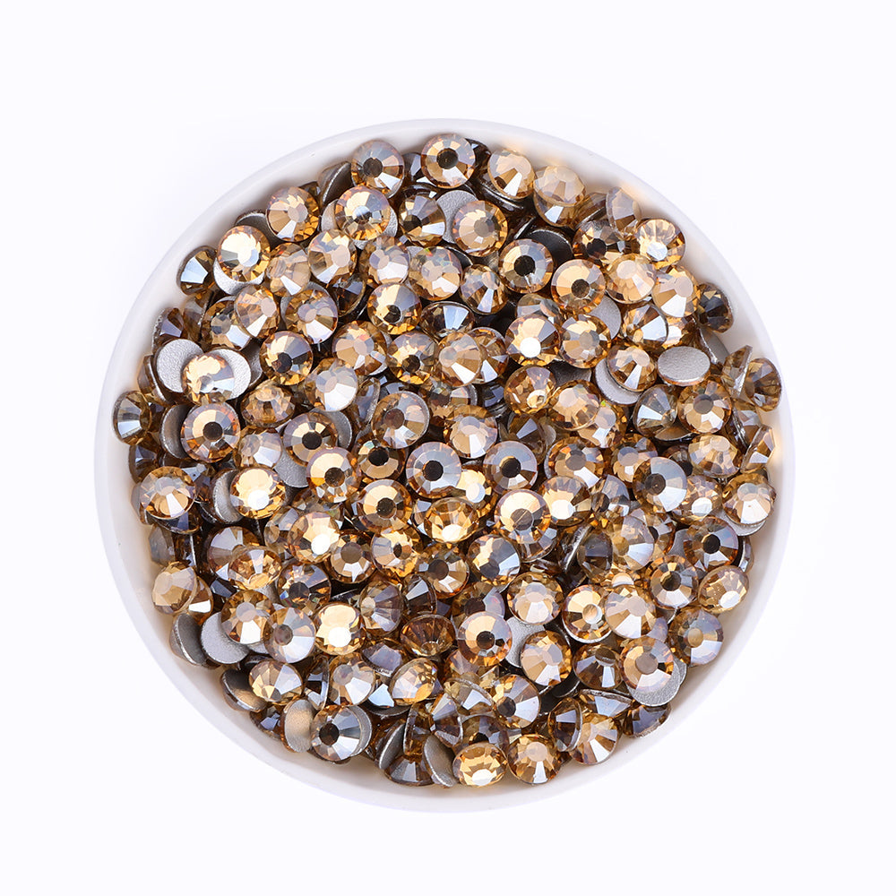 Golden Champagne rhinestones shown loose to show sparkle and cut