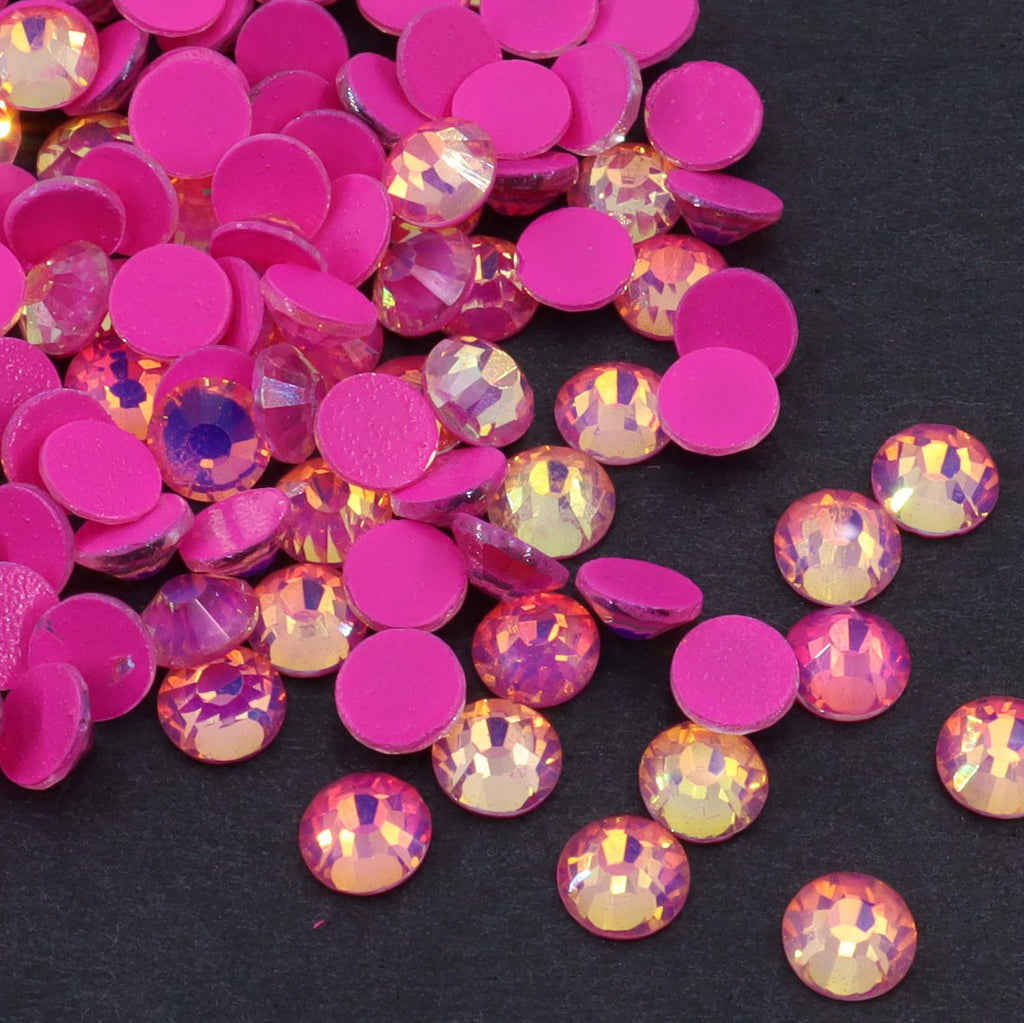 Dark Pink Luminous Opal rhinestones shown loose to show sparkle and cut