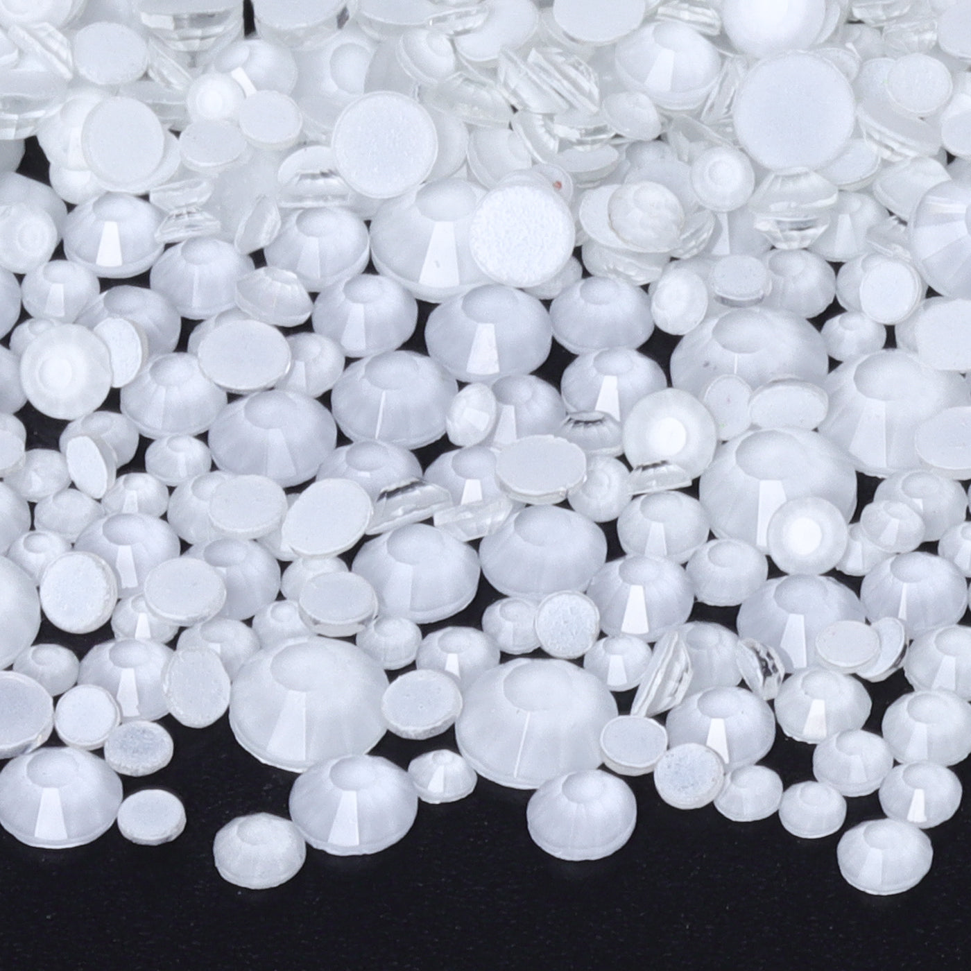 White Neon flatback rhinestones size comparison, SS3 to SS60
