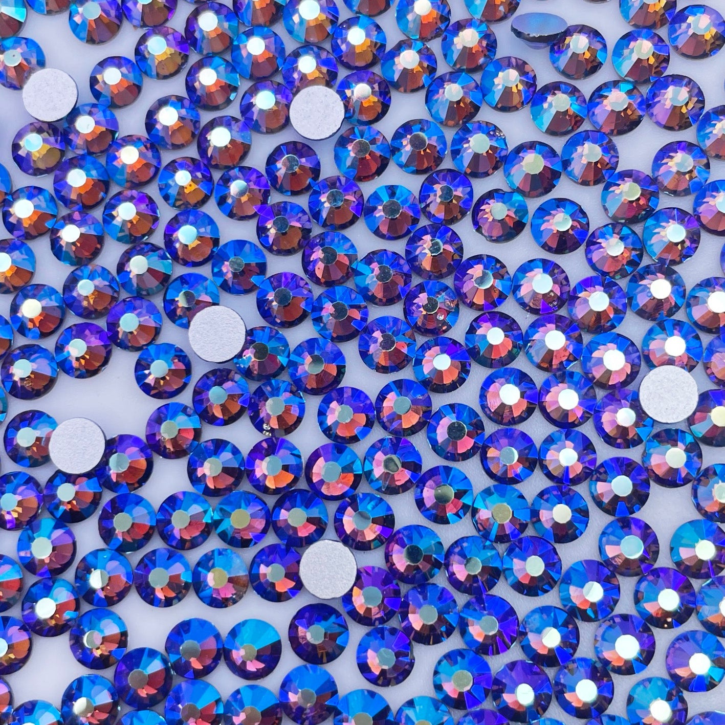 Tanzanite AB flatback rhinestones size comparison, SS3 to SS60
