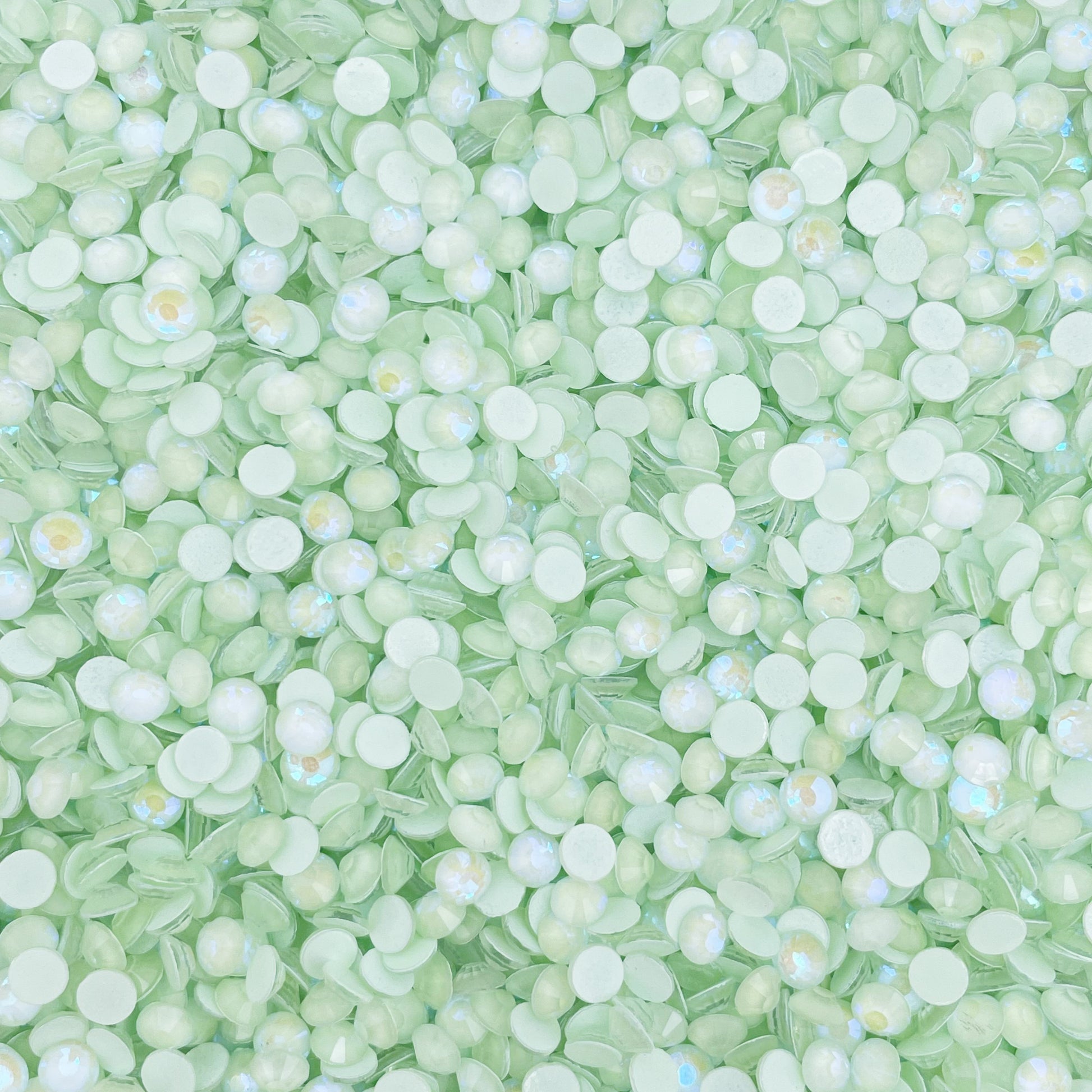 Light Peridot Luminous flatback rhinestones size comparison, SS3 to SS60