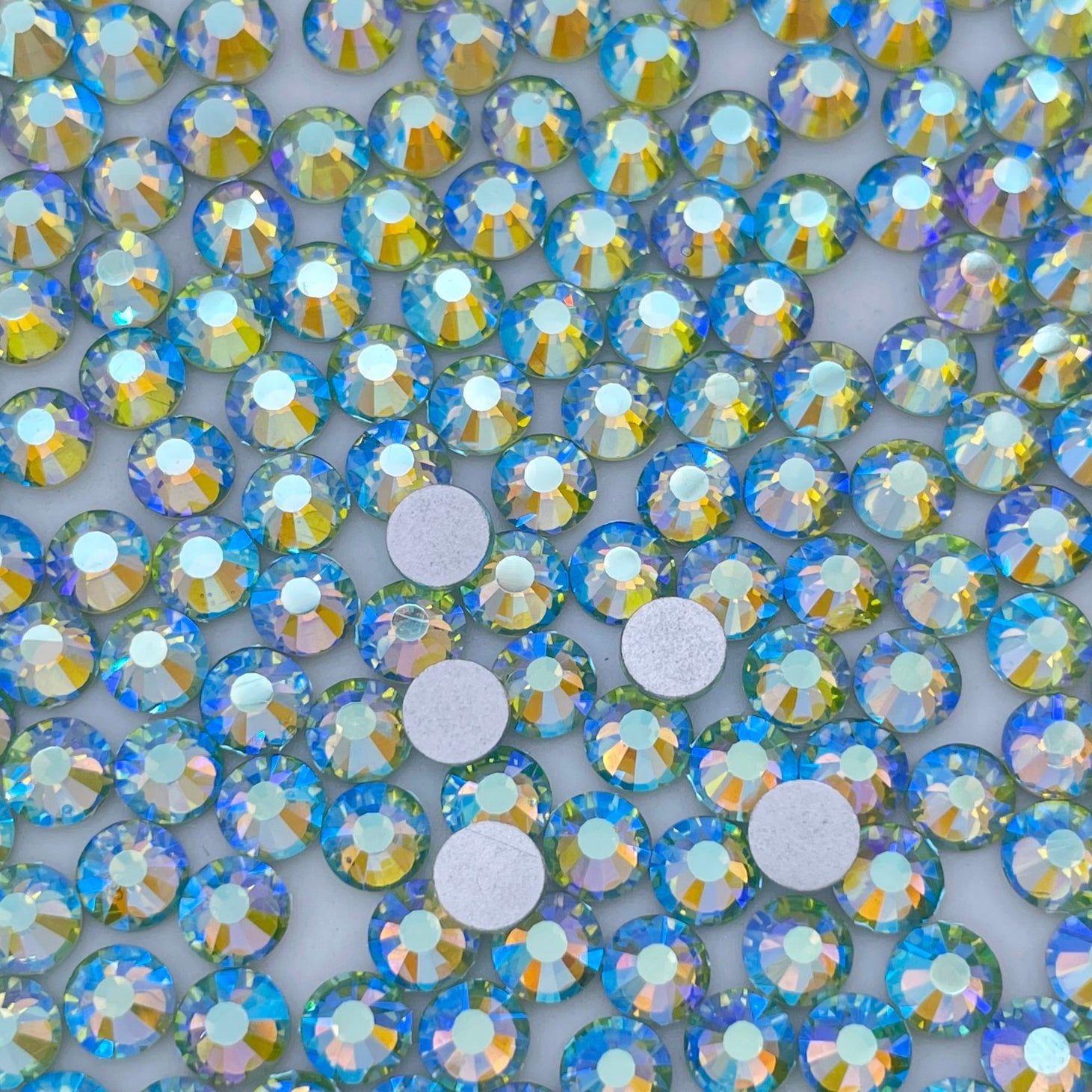 Light Peridot AB flatback rhinestones size comparison, SS3 to SS60