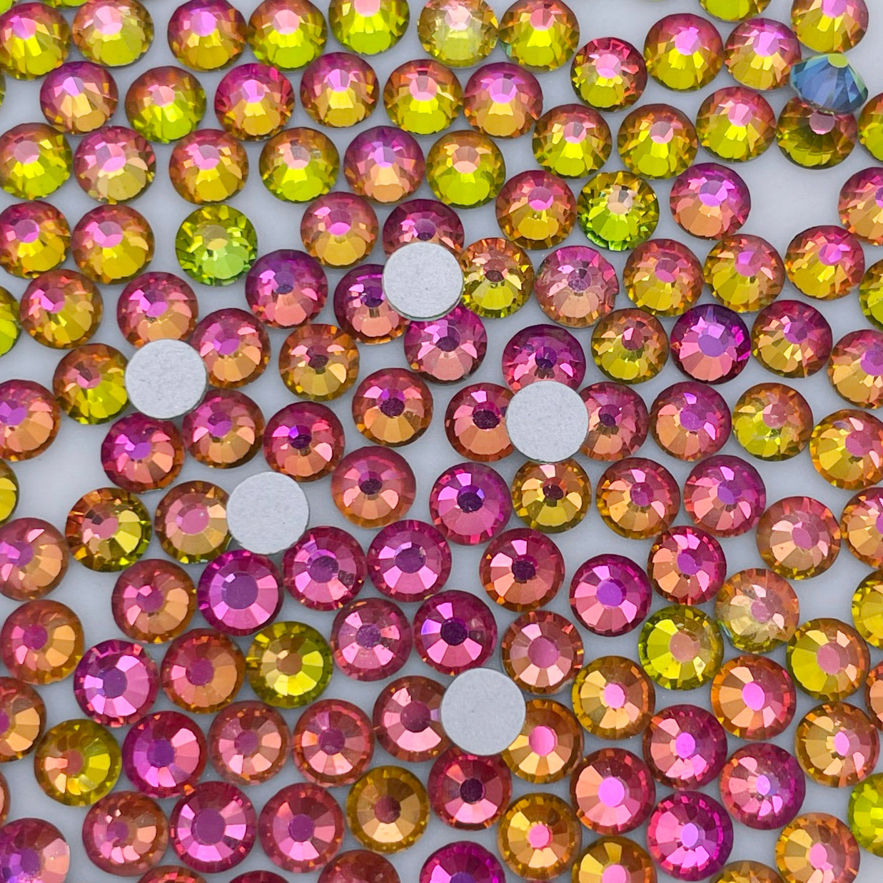 Rainbow flatback rhinestones size comparison, SS3 to SS60
