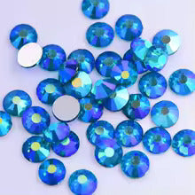 Close-up of Peacock Blue AB glass rhinestone facets and flat back