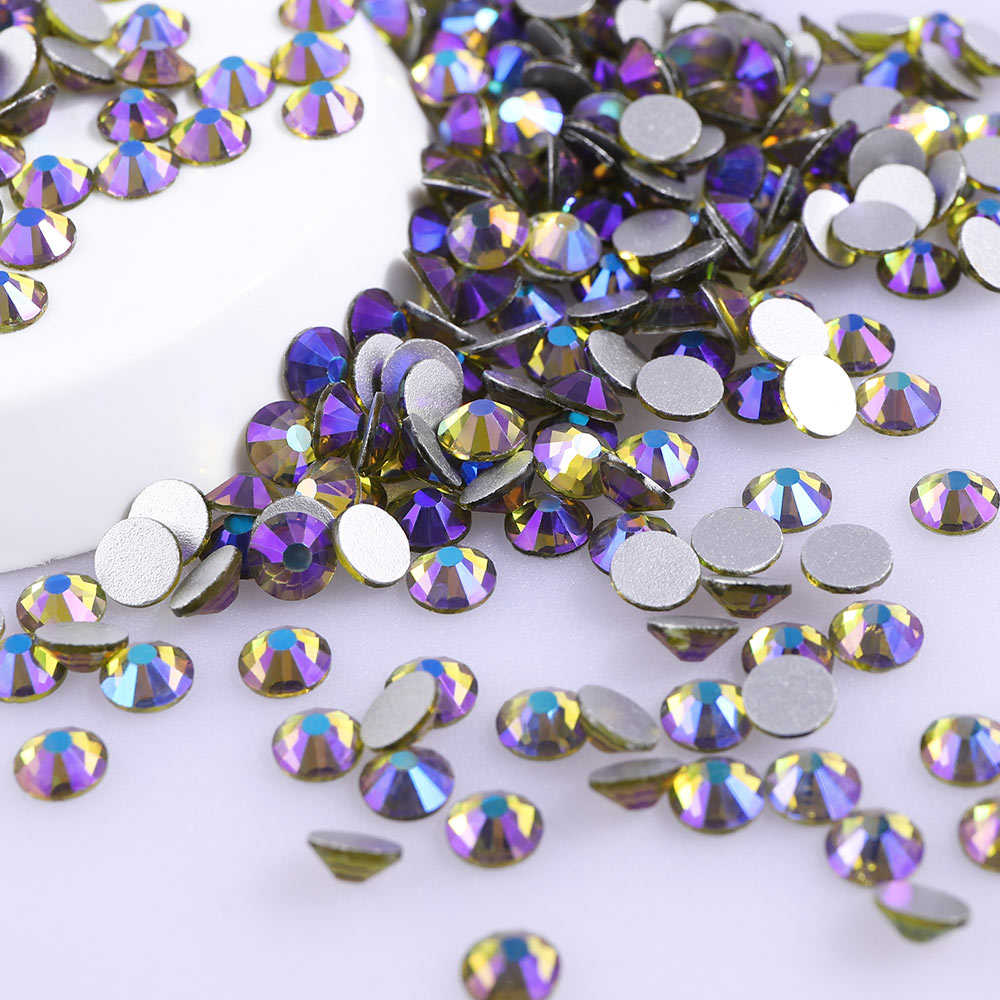 Close-up of Olive AB glass rhinestone facets and flat back