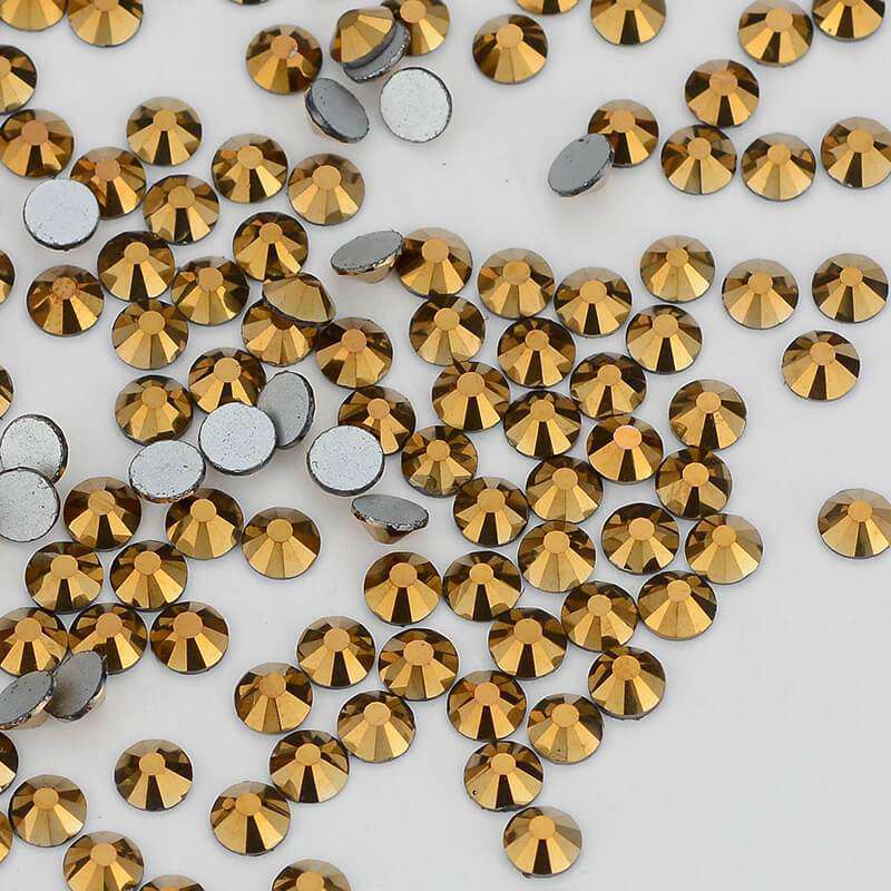 Close-up of Mine Gold glass rhinestone facets and flat back