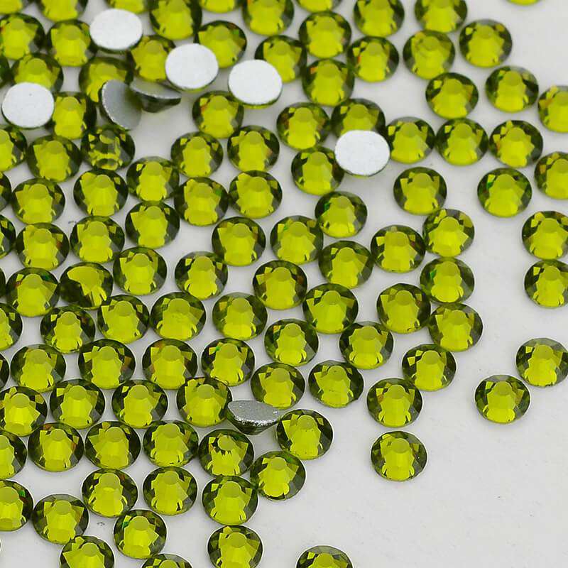 Close-up of Olive glass rhinestone facets and flat back