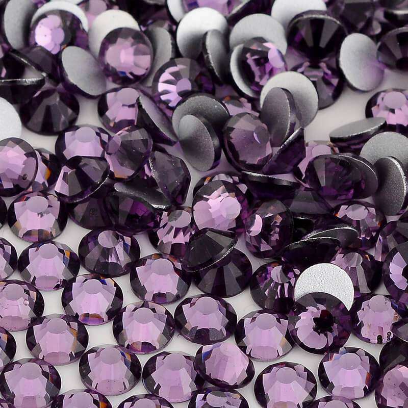 Tanzanite rhinestones shown loose to show sparkle and cut